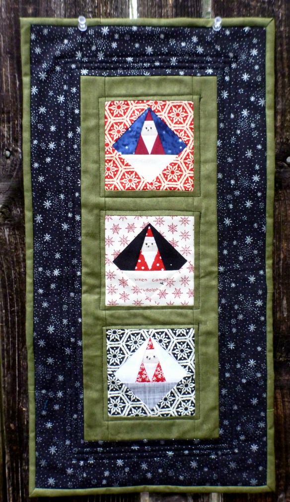 Completed 3 Primitive Santas