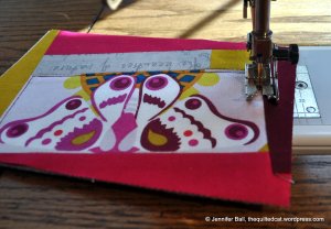 Quilt the postcard top